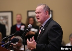 Judge Roy Moore speaks as he participates in the Mid-Alabama Republican Club's Veterans Day Program in Vestavia Hills, Alabama, Nov. 11, 2017.