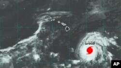 Une image satellite de la NASA montre l'ouragan Lane dans l’océan Pacifique central au sud-est des îles Hawaï, 20 août 2018.