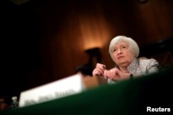 FILE - Federal Reserve Chair Janet Yellen testifies before a Senate Banking Committee hearing on the 'Semiannual Monetary Policy Report to the Congress' on Capitol Hill in Washington, July 13, 2017.