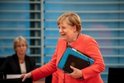 German Chancellor Angela Merkel arrives for the weekly cabinet meeting in Berlin, Germany, July 15, 2020.