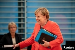 German Chancellor Angela Merkel arrives for the weekly cabinet meeting in Berlin, Germany, July 15, 2020.