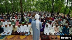 Rohingya refugee people take part in Eid al-Adha prayer near the Kutupalang makeshift refugee camp.