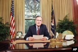 President Bush addresses the nation on television as he explains his decision to deploy American troops to Panama.