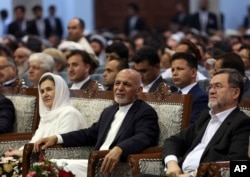 FILE - Afghan presidential candidate Ashraf Ghani attends the first day of campaigning in Kabul, Afghanistan, July 28, 2019.