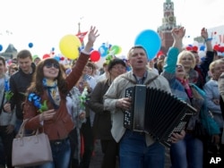 Members of Russian Trade Unions march during the May Day celebration at the Red Square in Moscow on May 1, 2014.