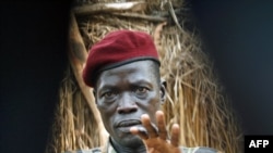 LRA commander Caesar Acellam gestures as he talks to the media after he was captured by Ugandan soldiers May 13.