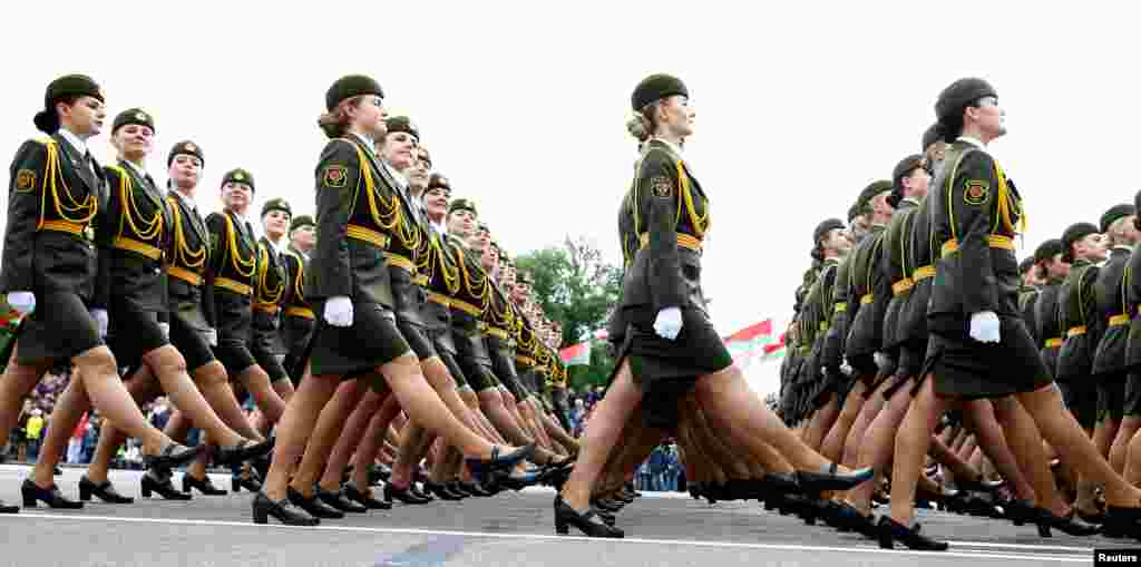 Belarussian servicewomen march during a military parade marking Belarus&#39; Independence Day in Minsk.