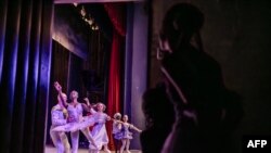 FILE - Dancers of the Dance Centre Kenya (DCK) perform during the production of the 'Nutcracker', a classical ballet traditionally performed in the Christmas period, at the Kenya National Theatre in Nairobi on November 25, 2023.