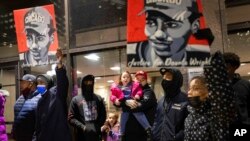 Protesters gather alongside the family of Daunte Wright outside the Hennepin County Government Center, Dec. 22, 2021, in Minneapolis. A former suburban police officer was found guilty of manslaughter Dec. 23 in Wright's fatal shooting.