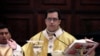 FILE - San Salvador's Archbishop Jose Luis Escobar Alas celebrates Mass at the Metropolitan Cathedral in San Salvador, El Salvador, Jan. 8, 2012. 