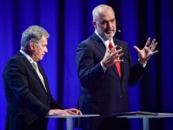 Finnish President Sauli Niinisto and Albanian Prime Minister Edi Rama speak during the Malmo International Forum on Holocaust Remembrance and Combating Antisemitism in Malmo, Sweden, October 13, 2021.