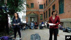 Reporters gather outside the Court of Final Appeal in Hong Kong, March 25, 2013. 