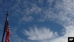 A hole-punch cloud over Alabama