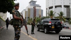 Security officers patrol outside a luxury hotel, days after a string of suicide bomb attacks across the island on Easter Sunday, in Colombo, Sri Lanka, April 27, 2019.