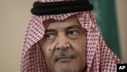 FILE - Saudi Foreign Minister Prince Saud al-Faisal pauses as he makes a statement to the media in Riyadh, Jan. 5, 2014.