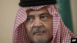 FILE - Saudi Foreign Minister Prince Saud al-Faisal pauses as he makes a statement to the media in Riyadh, Saudi Arabia, Jan. 5, 2014.