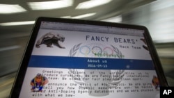 A screenshot of the Fancy Bears website fancybear.net is seen on a computer screen in Moscow, Russia, Sept. 14, 2016. Confidential medical data of several U.S. Olympians hacked from a World Anti-Doping Agency database was posted online Sept. 13, 2016.