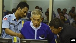 Kaing Guek Eav, alias Duch, ran the notorious Toul Sleng prison, where up to 16,000 people were tortured before being killed, at the U.N.-backed war crimes tribunal in Phnom Penh, Cambodia, Monday, March 19, 2012.