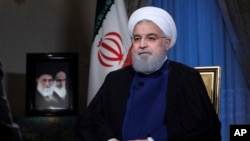 하산 로하니 이란 대통령이 6일 테헤란에서 TV로 생중계되는 대담 프로그램에 출연해 발언하고 있다. 
