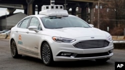 An Argo self-driving car is tested in Pittsburgh, Pennsylvania, Jan. 22, 2018. Argo is a company owned by Ford. 