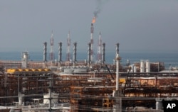 FILE - A partially constructed gas refinery at the South Pars gas field is seen on the northern coast of Persian Gulf in Asalouyeh, Iran, Jan. 22, 2014.