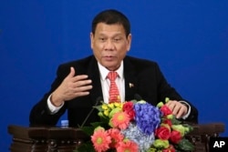 Philippine President Rodrigo Duterte delivers a speech during the Philippines-China Trade and Investment Forum at the Great Hall of the People in Beijing, Oct. 20, 2016.