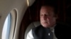 FILE - Pakistani Prime Minister Nawaz Sharif looks out the window of his plane after attending a ceremony to inaugurate the M9 motorway between Karachi and Hyderabad, Pakistan. Prime Minister Nawaz met Monday with Saudi King Shah Salman bin Abdul Aziz in Jeddah, but no progress was reported in resolving the crisis.