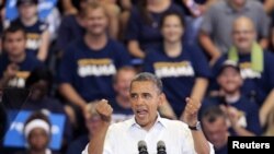 President Barack Obama speaks during a campaign rally at Scott High School, in Toledo, Ohio, September 3, 2012.