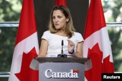 FILE - Canadian Foreign Minister Chrystia Freeland takes part in a news conference at the Embassy of Canada in Washington, Aug. 31, 2018.