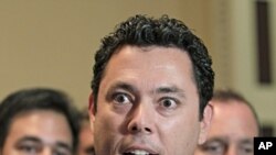 Rep. Jason Chaffetz and other House Republicans react to passage of the conservative deficit reduction plan he sponsored known as 'Cut, Cap and Balance,' on Capitol Hill in Washington, July 19, 2011