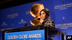 FILE - America Ferrera announces nominations for the 73rd annual Golden Globe Awards at the Beverly Hilton hotel in Beverly Hills, Calif., Dec. 10, 2015.