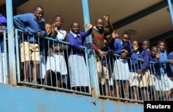 Students are seen outside their classrooms on the second week of a national teachers' strike, at Olympic Primary School in Kenya's capital Nairobi, September 9, 2015.