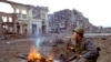 Фото: російський солдат а Грозному, Чечня, 1995 рік. (AP Photo/Shakh Aivazov, File)