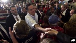 Supporters of Republican presidential candidate, former Massachusetts Gov. Mitt Romney cheer as he addresses a crowd at a campaign event, in Broomall, Pennsylvania, April 4, 2012. (AP)
