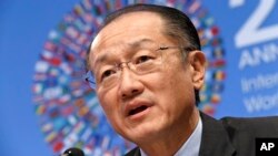 World Bank President Jim Yong Kim speaks during a news conference at International Monetary Fund (IMF) headquarters in Washington. 