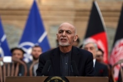 FILE - Afghan President Ashraf Ghani speaks during a news conference at presidential palace in Kabul, Afghanistan, Feb. 29, 2020.