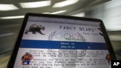 A screenshot of the Fancy Bears website fancybear.net is seen on a computer screen in Moscow, Russia, Sept. 14, 2016. Confidential medical data of several U.S. Olympians hacked from a World Anti-Doping Agency database was posted online Sept. 13, 2016.