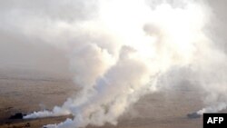 Georgian army tanks take part in a military exercise near the Vaziani military base close to the Georgian capital, Tbilisi, Jan. 30, 2015.