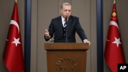 Le président turc Recep Tayyip Erdogan donne un discours avant son voyage en Chine et aux États-Unis, à Ankara, Turquie, le 12 mai 2017. 