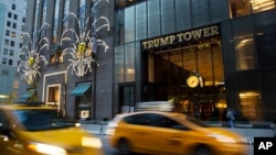 Traffic passes Trump Tower in New York, Nov. 21, 2016. 