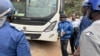 Opposition leader Jameson Timba (in blue jacket and black hat) is shown after his arrest in Harare, Zimbabwe in June 2024 