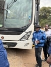 Opposition leader Jameson Timba (in blue jacket and black hat) is shown after his arrest in Harare, Zimbabwe in June 2024 