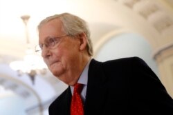 Senate Majority Leader Mitch McConnell of Ky., walks to his office on Capitol Hill in Washington, April 9, 2020.