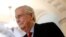 FILE - Senate Majority Leader Mitch McConnell of Kentucky walks to his office on Capitol Hill in Washington, April 9, 2020.