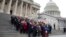 Actress America Ferrera, surrounded by House Democrats and immigration leaders, speaks during a new conference to announce a DemandAVote discharge petition, on the steps of the Capitol in Washington, March 26, 2014.