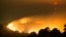 This handout picture provided by Oliver Watson of http://ownzproductions.wixsite.com/home shows flames from the wildfire on Worsleys Road in Christchurch, New Zealand, before sunrise.