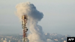 Smoke billows from the site of an Israeli air strike on the village of Taybeh in southern Lebanon on October 15, 2024.