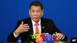 Philippine President Rodrigo Duterte delivers a speech during the Philippines-China Trade and Investment Forum at the Great Hall of the People in Beijing, Oct. 20, 2016. 