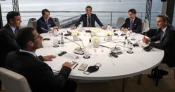 French President Macron opens the MED7 summit with Malta's PM Robert Abela, Spain's PM Pedro Sanchez, Cyprus President Nikos Anastasiadis, Italy's PM Giuseppe Conte and Greek PM Kyriakos Mitsotakis, in Porticcio, Sept. 10, 2020.