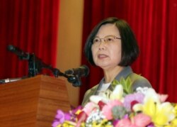 Taiwan's President Tsai Ing-wen delivers a speech during the Armed Forces Day ceremony in Taipei, Taiwan, Aug. 30, 2019. Tsai Ing-wen says the island has been “aggressively promoting indigenous national defense” with help from U.S. arms sales.